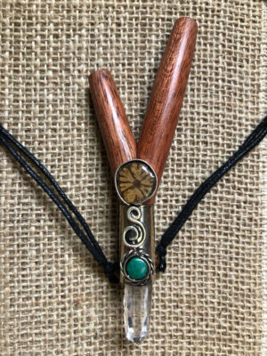 Gorgeous bloodwood kuripé finely decorated with an Ayahuasca flower and crystals inserted in silver frame.