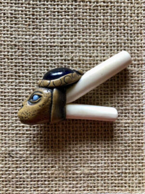 Beautiful kuripé made from bone hand carved with jaguar head crowned with glass blue pebble